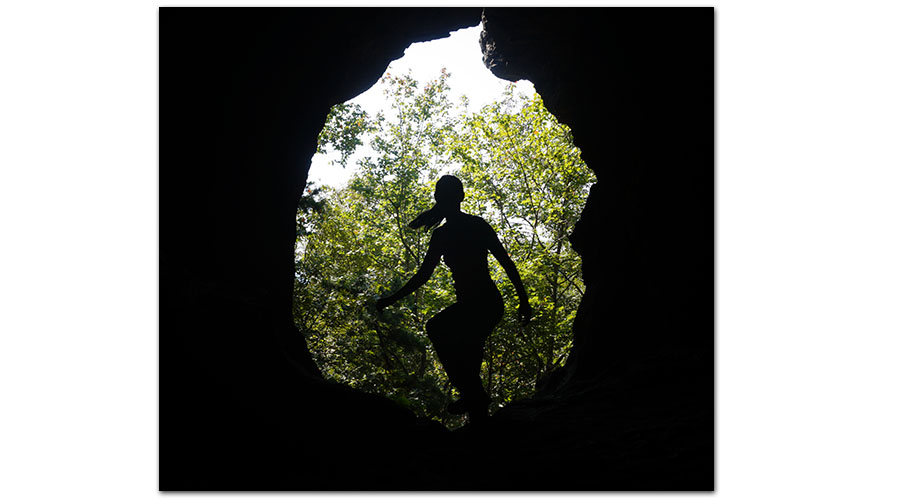 silhouette from inside of the rocks