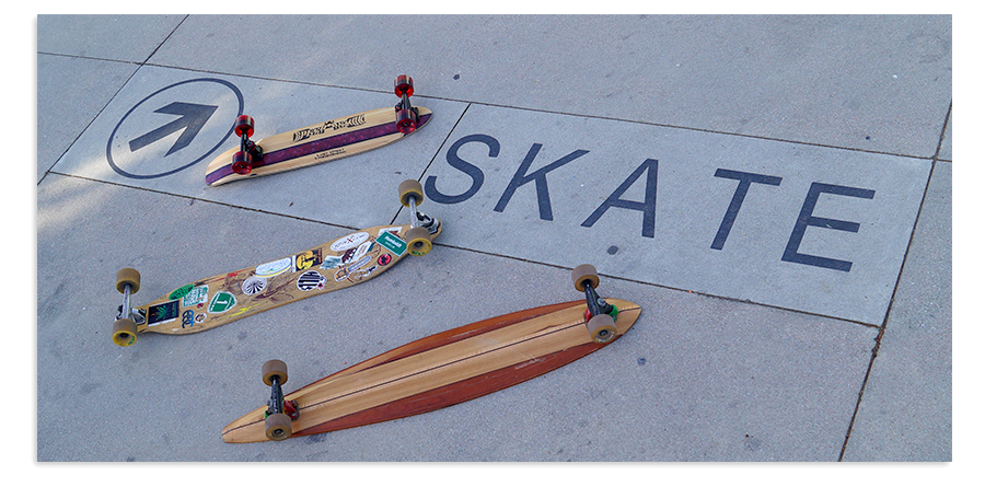 longboards on the pavement