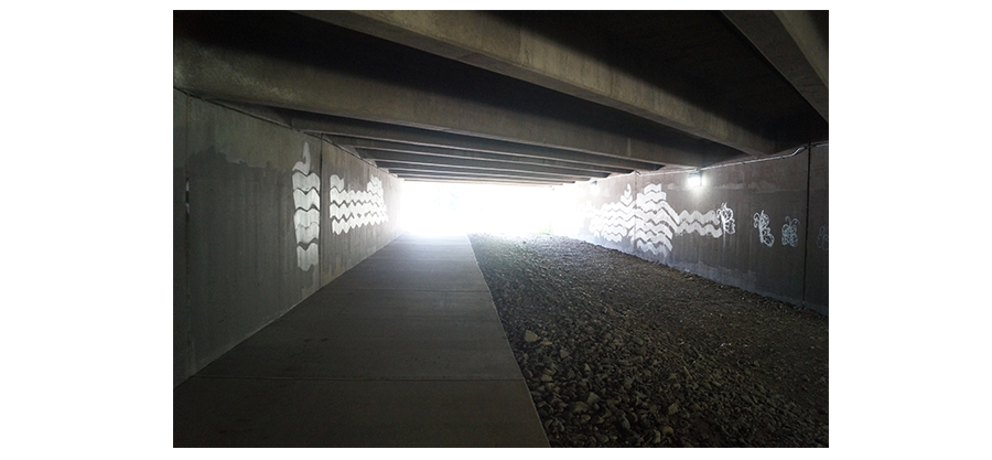 path passes under a bridge