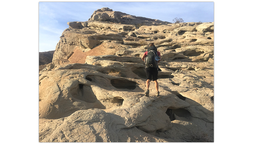 climbing the rock formation