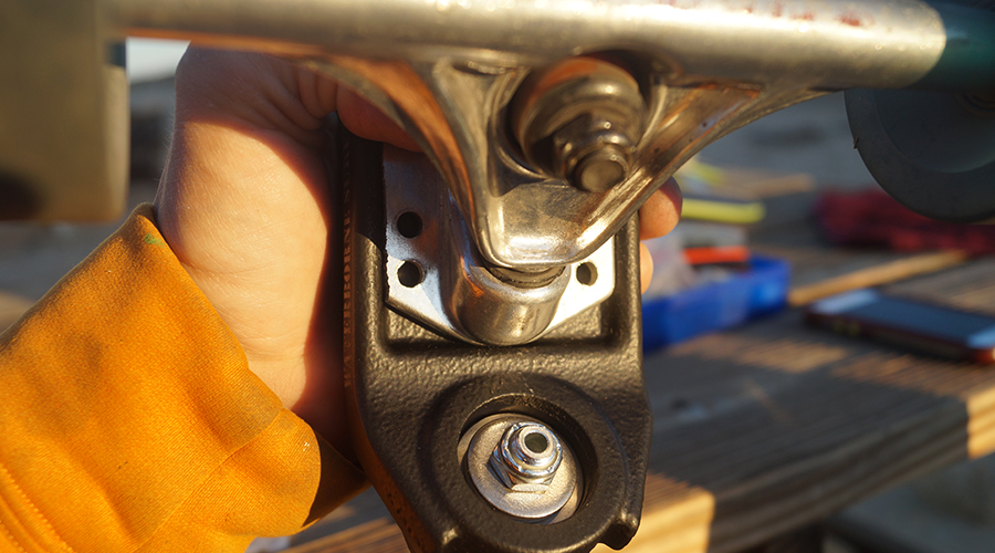 attaching the surf adapter to the longboard trucks