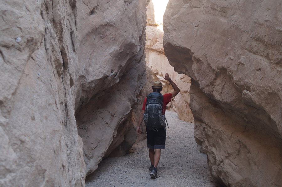 Hiking through narrow Truckhaven canyon in Anza Borrego