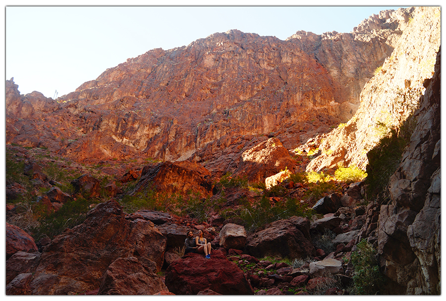 couple on a boulder in the red rock canyon