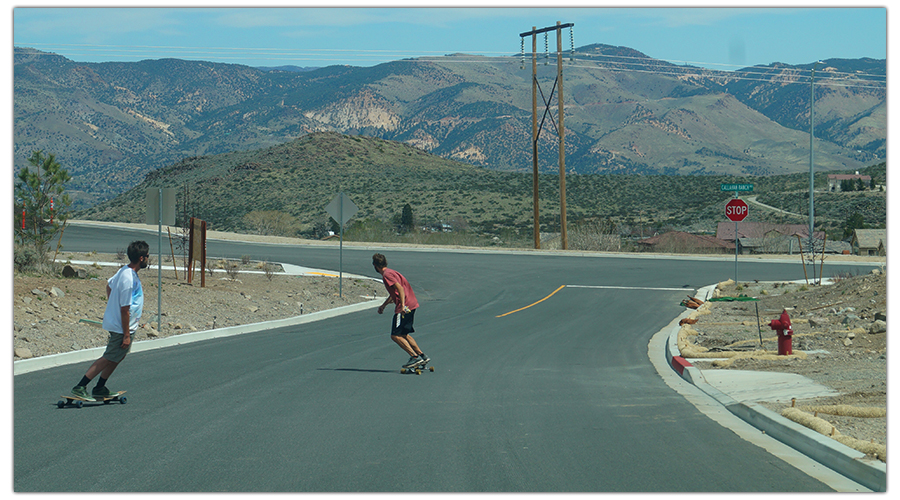 Longboarding in with mountains in Reno Nevada