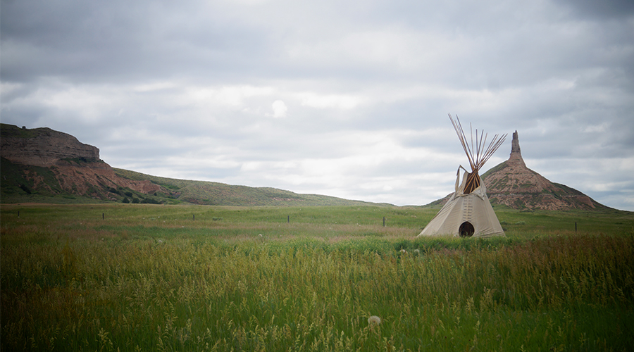 chimney rock and a teepee