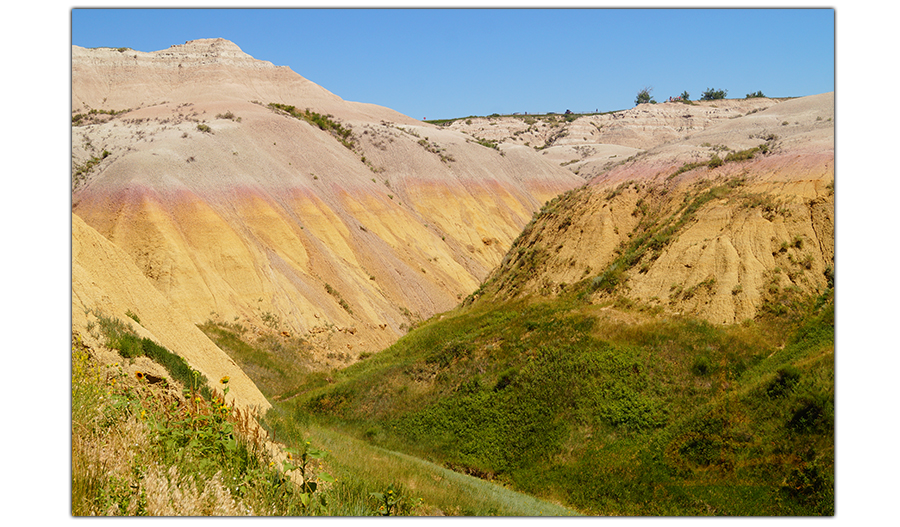 yellow and pink mounds at badlands national park