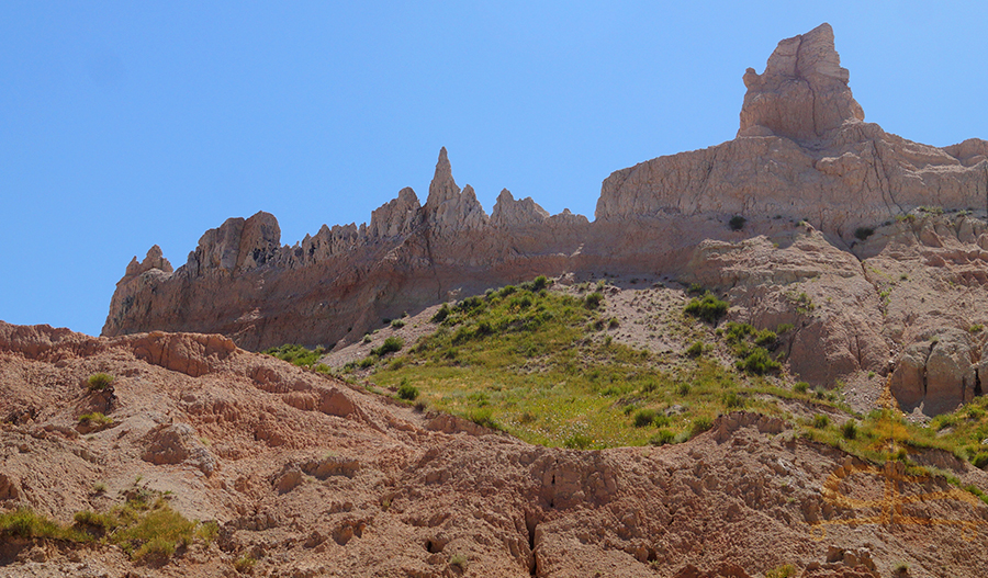 towering badlands spires seen from hike in badlands national park