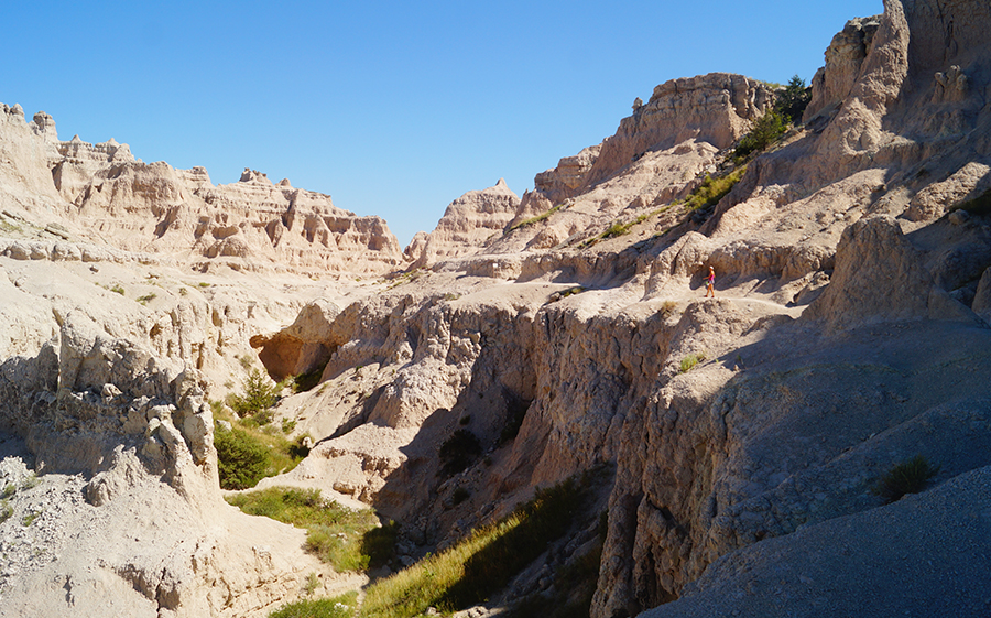 hiking along a badland ravine