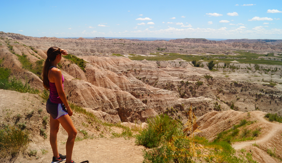 overlooking the sprawl of badlands from a hike in badlands national park