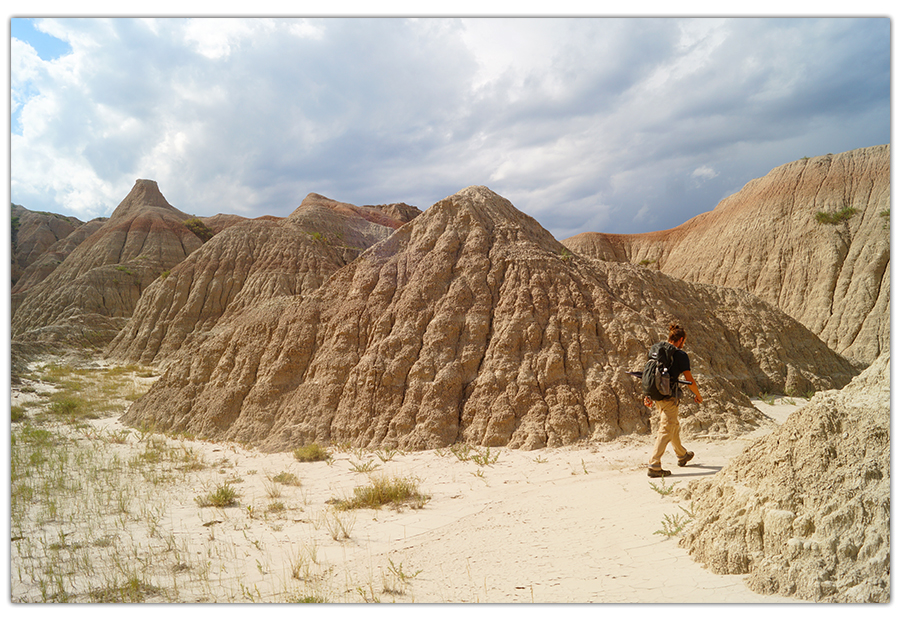 hiking through badlands formations