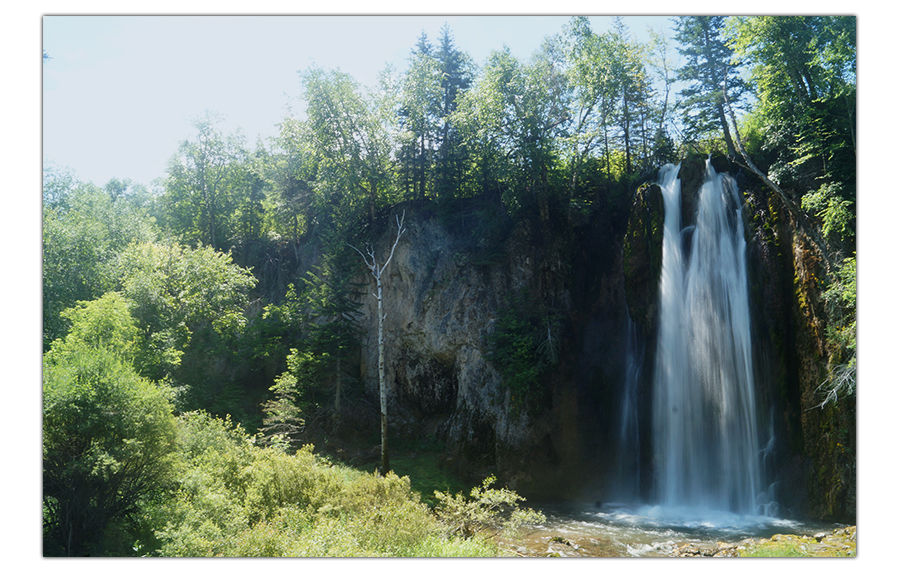 waterfall on the spearfish canyon scenic byway in the black hills