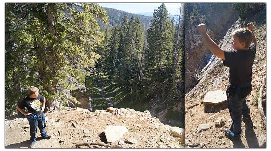 celebrating making it to the top of a mountain pass