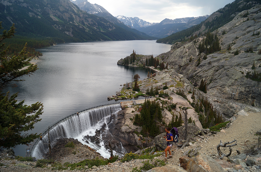 hiker near mystic lake dam