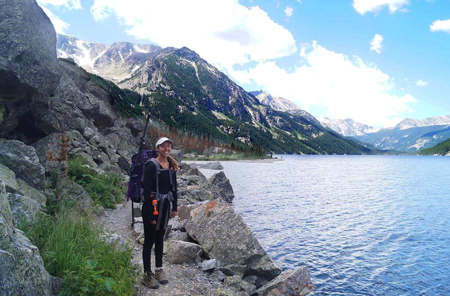 backpacker on mystic lake shore