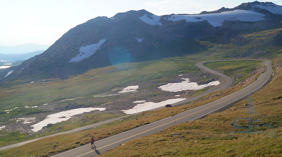 longboarder enjoying the curves of beartooth highway