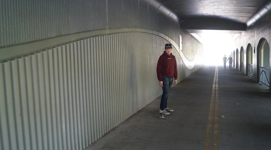 longboarding through tunnel in boise