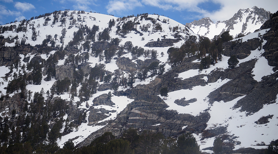 snowy covered granite mountainside