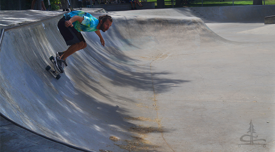 longboarding the banked turns at the Bishop Skatepark