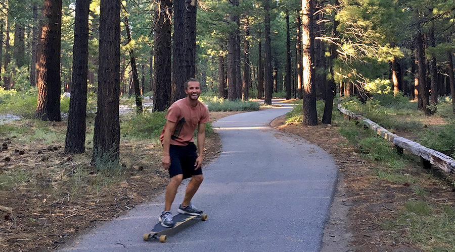longboarding through the woods on the mammoth lakes trail system