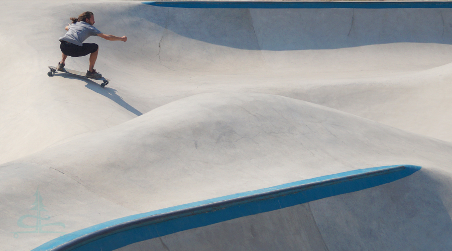 pumping along the smooth skatepark features