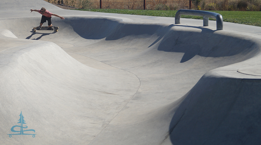 hitting the banked turns at the wild rose skatepark