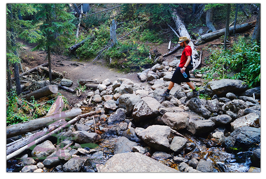 rocky river crossing while hiking to whitney lake