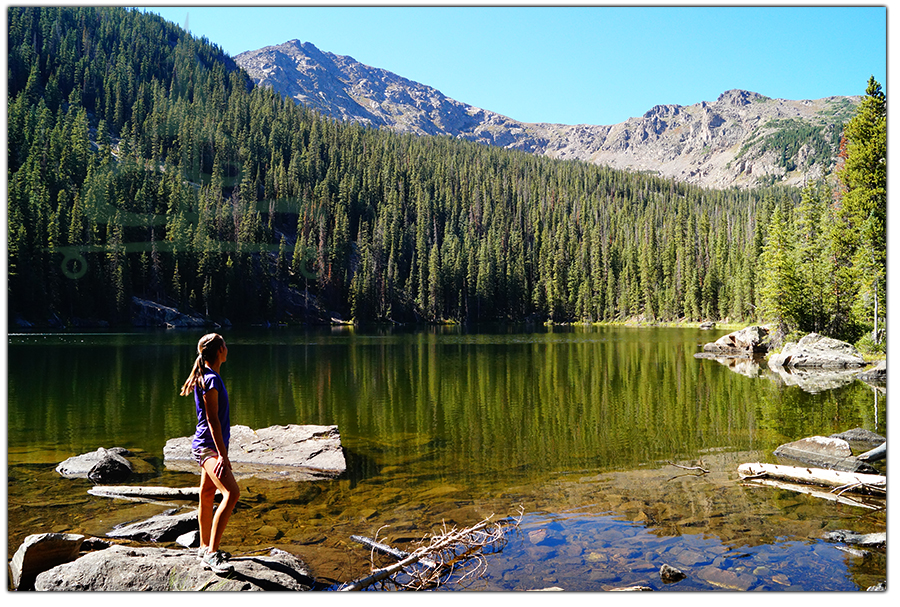 rewarding forest and mountain backdrop after hiking to whitney lake