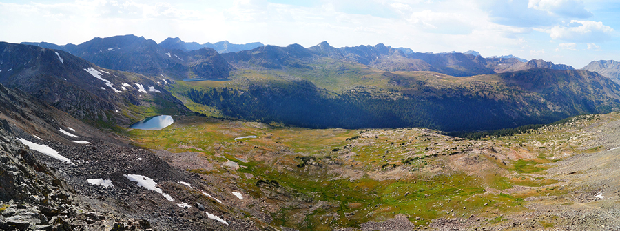 view of the sprawling mountains and lakes below from atop W peak 
