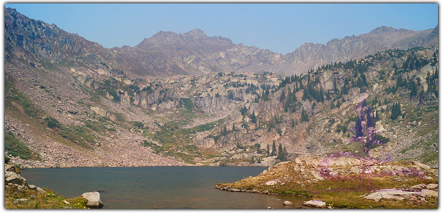 view of pitkin lake with a rugged mountainous backdrop