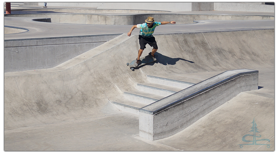 wall riding on a longboard