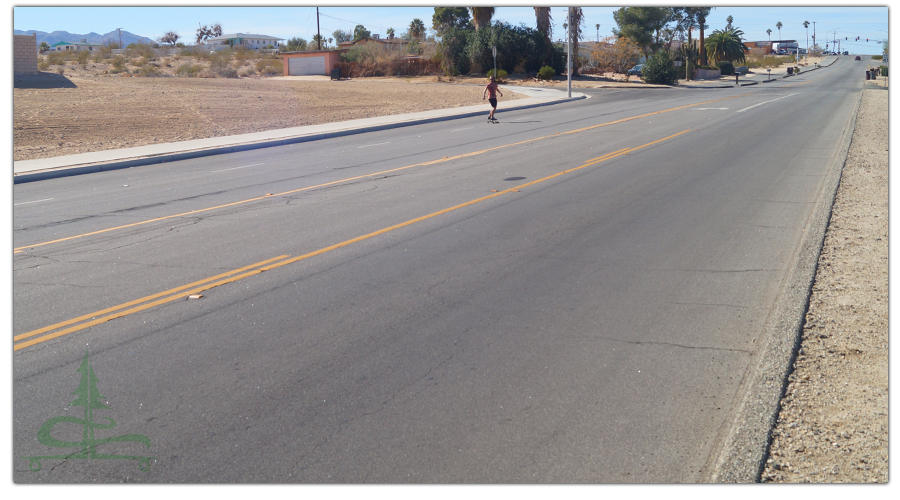 cruising a hill longboarding in twentynine palms