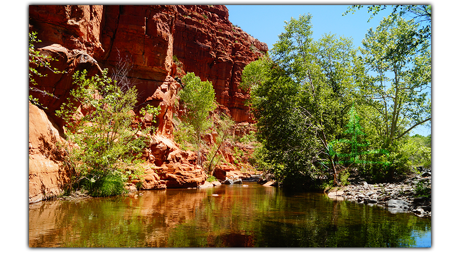 beautiful red rock canyon with creek 