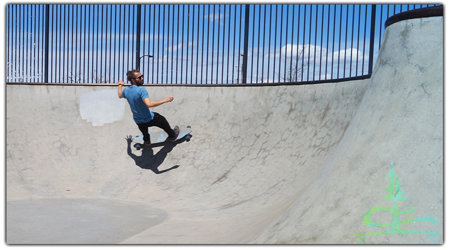 cruising the banked turn on a longboard