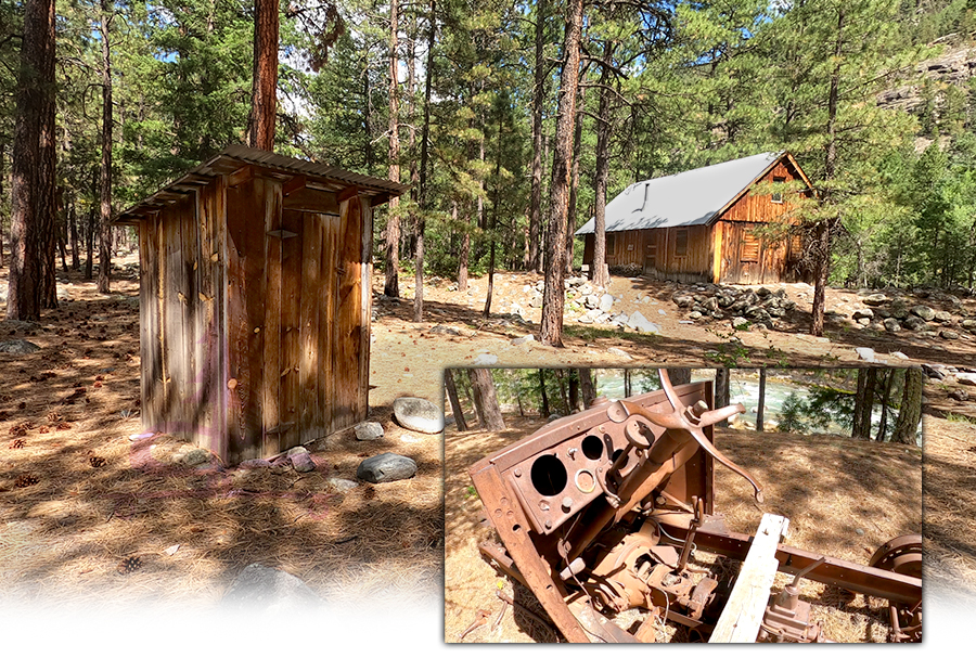 abandoned cabin and rusty remnants near the railroad