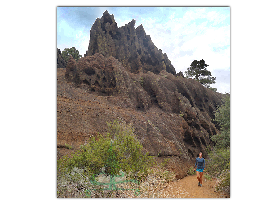 tall black rock formations along the trail