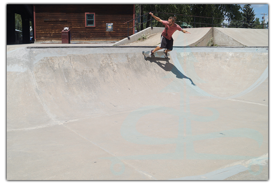 longboarding in the main bowl at the crested butte skatepark