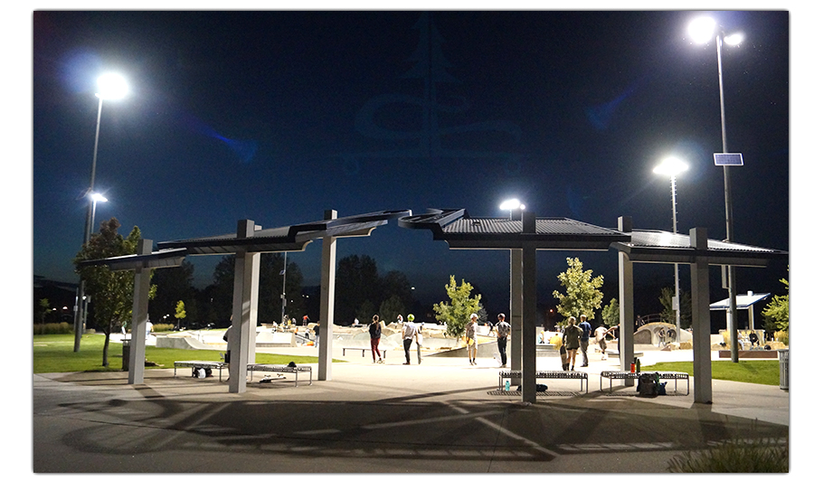entrance to the arvada skatepark with lights and a roof for shade