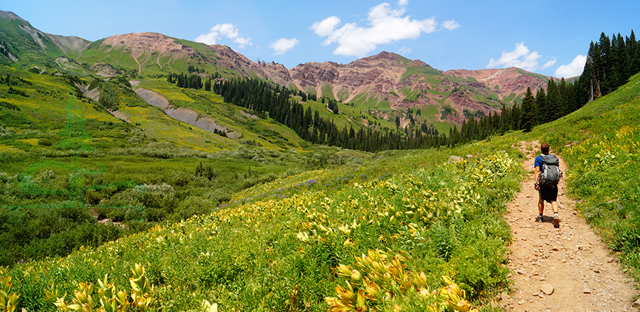 hiking into the maroon snowmass wilderness in colorado