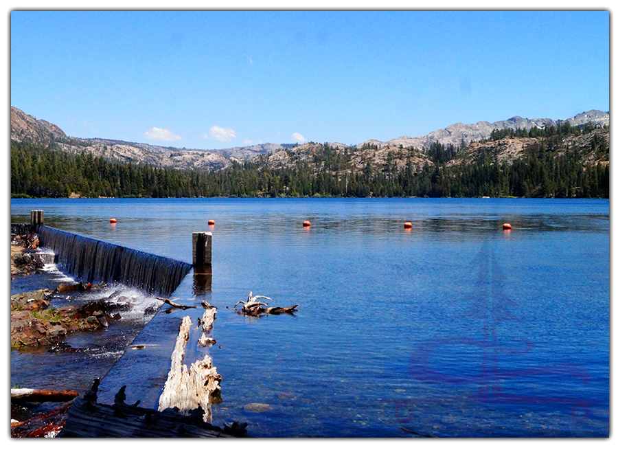 dam at sawmill lake with tahoe national forest mountain backdrop
