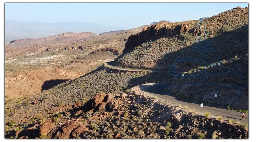 longboarder on the curves of route 66 near oatman