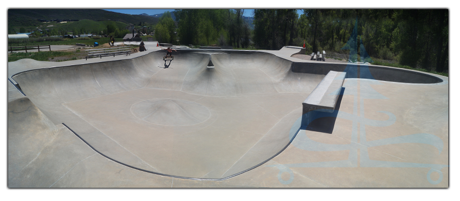 longboarding the large bowl at the skatepark in steamboat springs