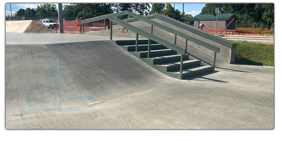 stairs, rails and box at centennial skatepark in greeley